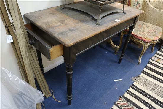 A Heal & Sons pine top ebonised side table 3ft 6in.